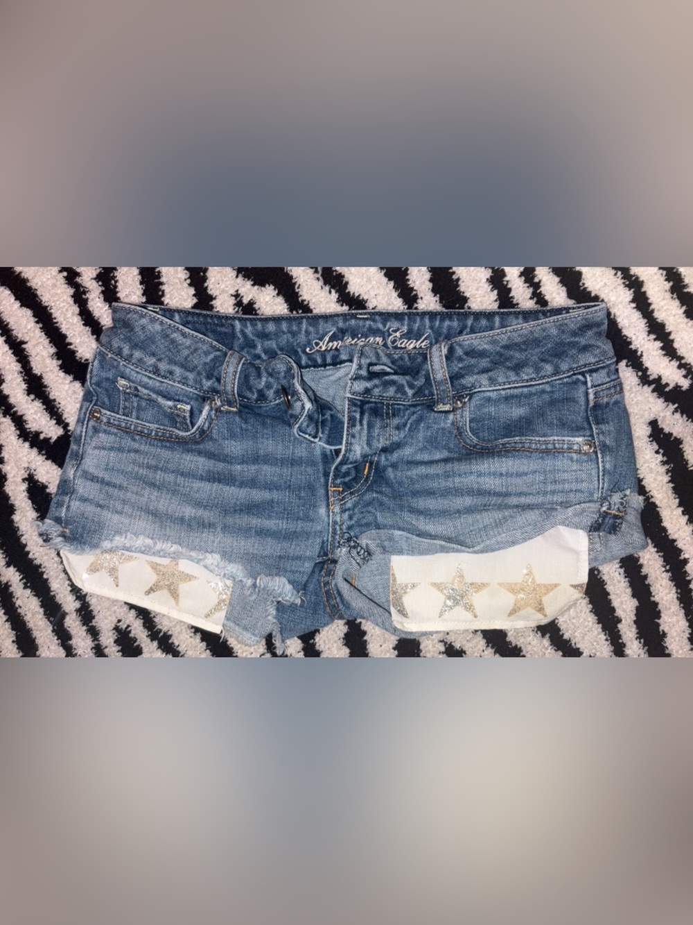 American Eagle Outfitters Light Blue Denim Cropped Jeans with Star Pocket Lining
